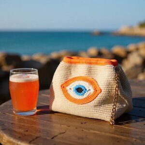 Handmade Crochet Evil Eye Clutch – Boho Chic Bag in Orange